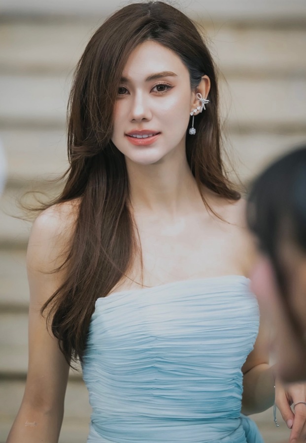 Lena Lalina in light-blue strapless dress — Instagram @lalinalena (Official)